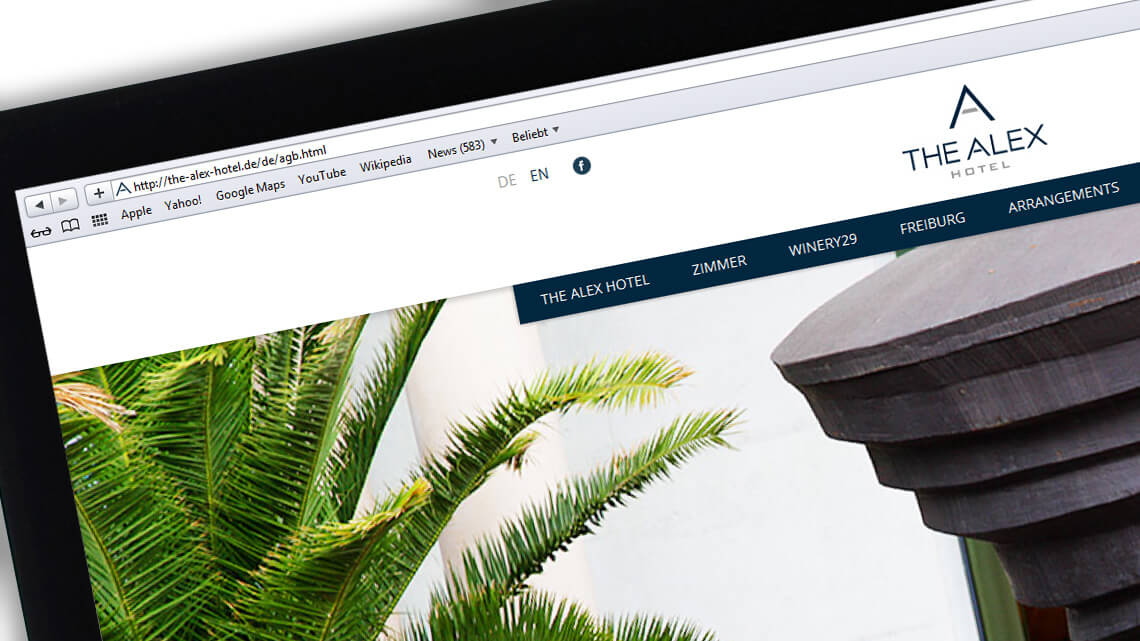 Nahansicht von der Webseite von The Alex Hotel auf einem Bildschirmausschnitt